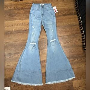 Vibrant Light Blue Distressed Flare Jeans